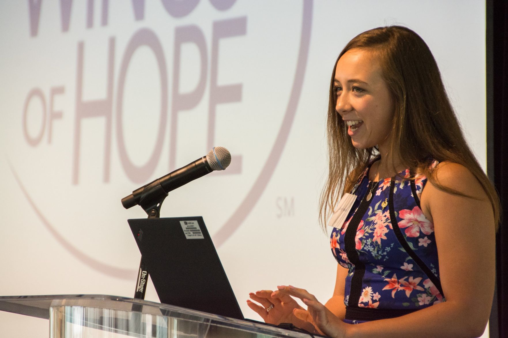 Emily Mueth, a recent graduate of SLU Nursing gives an introduction to the featured speaker of the afternoon